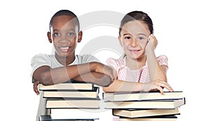 Two children supported on a stack of books photo