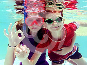 Two chilldren underwater