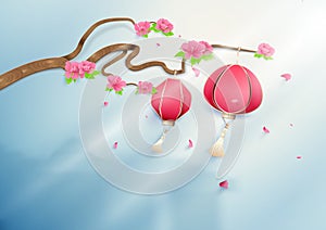 Two chinese lanterns hanging on floral branch pink peonies