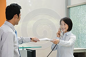 Two Chinese office workers