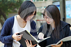 Two Chinese university students on campus