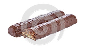 Two chocolate bars lying parallel, one of which is bitten, isolated on a white background with shadows.