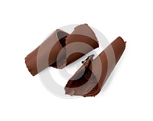 Two chocolate shavings isolated on white, top view