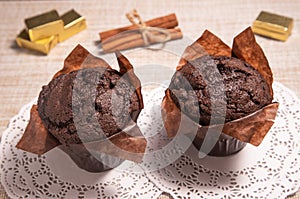 Two chokolate muffins on the table