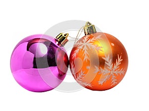 Two Christmas balls of orange and green