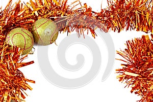 Two Christmas baubles with bright orange tinsel