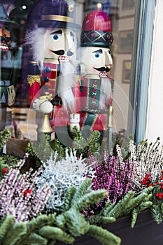 Two Christmas big wooden traditional nutcrackers in shop window