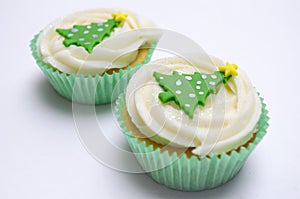 Two Christmas cup cakes