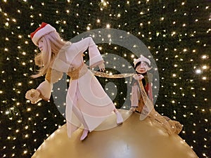 Christmas elfs on a christmas ball photo