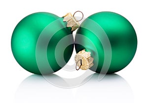 Two Christmas green baubles isolated on white background