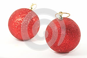 Two Christmas tree ornaments, shallow depth