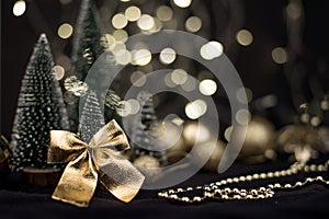 Two Christmas trees decorated and gifts for the new year on the bokeh background, new year mood 2021