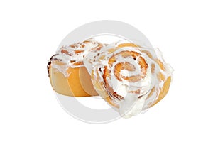 Two cinnamon buns with icing
