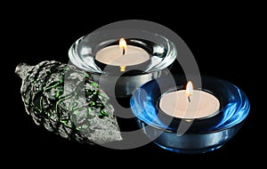 Two circular candle and christmas-tree decoration