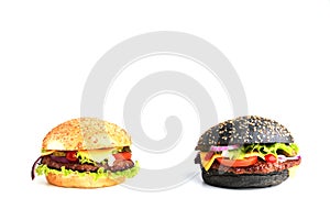 Two classic burgers isolated on white background.