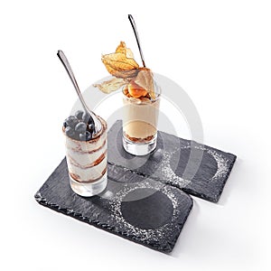 Two Classic Desserts with Cheesecake and Tiramisu Isolated