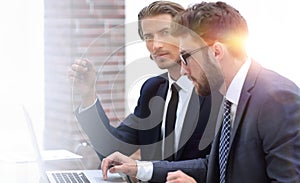 Two clerks working at the Desk