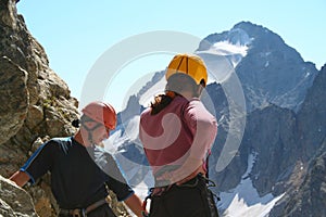 Two climbers looking down