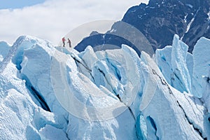 Two climbers reached the top of iceberg photo