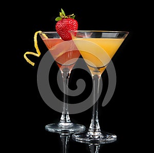 Two cocktails red cosmopolitan cocktail decorated with citrus le