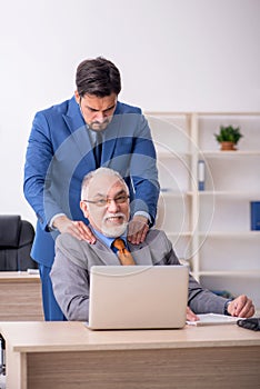 Two colleagues working in the office