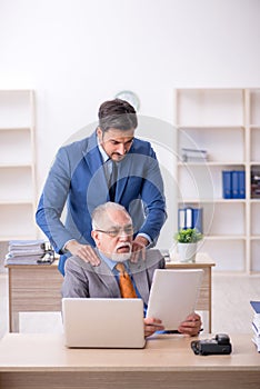 Two colleagues working in the office