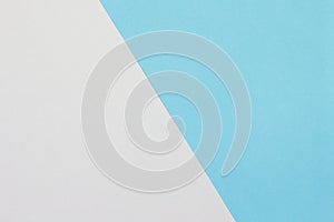 Two color paper with blue and white Overlap on the floor And split half of the image.