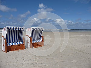 Two colorful beachchairs on the island of amrum