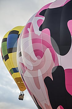 Two Colorful Hot Air Balloons in the sky