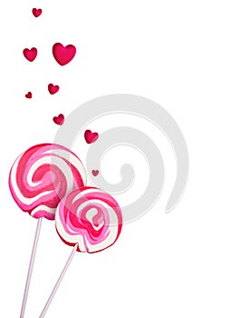 Two colorful lollipops with floating hearts