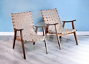 Two comfortable wooden easy chairs