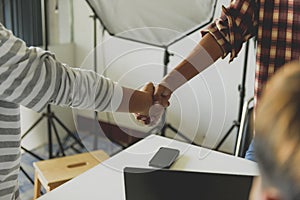 Two confident businessman shook hands during office meetings