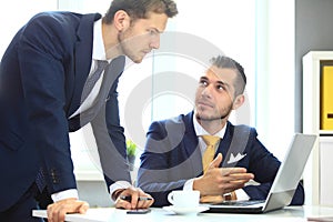 Two confident businessmen networking