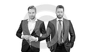 two confident men businessmen in formal suit are business partners isolated on white, leadership