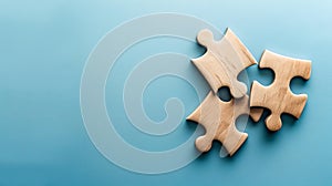 Two connected jigsaw puzzle pieces on blue background. concept of connection, solution, and teamwork. minimalist style