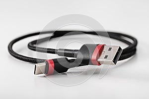 Two connectors on an elastic wire for connecting to devices.