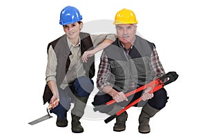 Two construction workers.