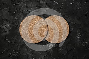 Two cork beer coasters