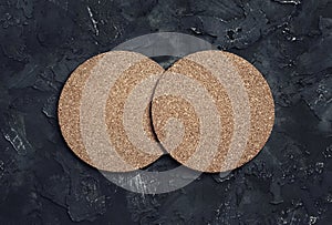 Two cork beer coasters