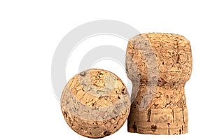 Two corks of champagne close-up on a white background