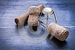 Two corks of champagne wires and corckscrew