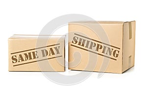 Two carton parcels with Same Day Shipping imprint