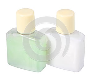 Two cosmetic cream in transparent bottles