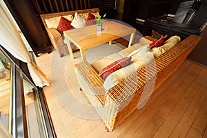 Two couches and table in empty restaurant