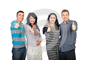 Two couples giving thumbs