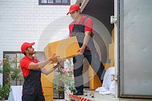 Two Couriers Handing Over Packages to Customers at Home