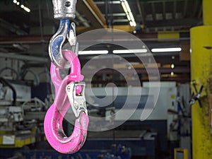 Two crane hooks in the factory