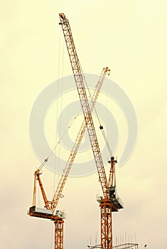 Two cranes at construction site