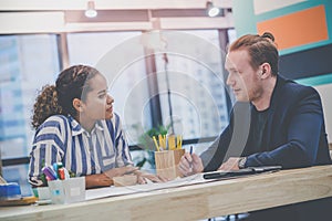 Two Creative Marketeer is brainstorming on business data