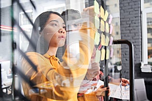 Designers discussing and developing mobile applications